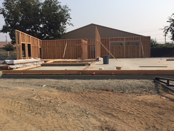 The framing for the first walls for the new Empire Library is up.