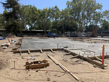 Foundation being poured for the new additon to the library.