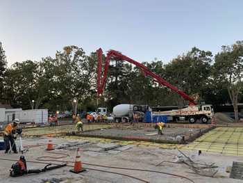 Foundation being poured for the new additon to the library.