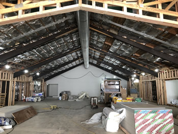 The interior of the library with unfinished walls.