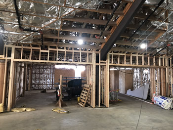 The interior of the library with unfinished walls.