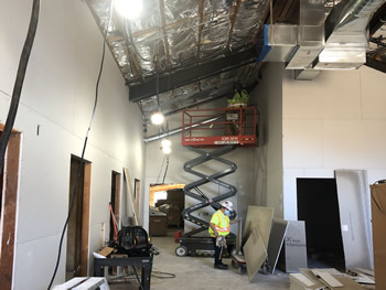 The interior of the library with unfinished walls.