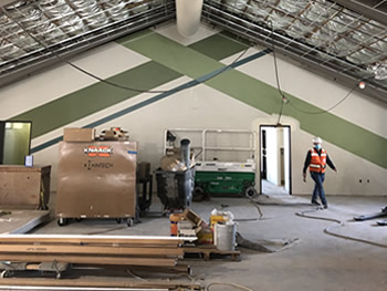 The interior of the library with unfinished walls.