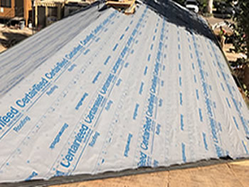 View of the roof of the library with the underlayment on the roof.