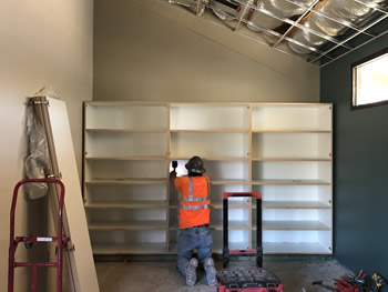 The interior of the library with unfinished walls.